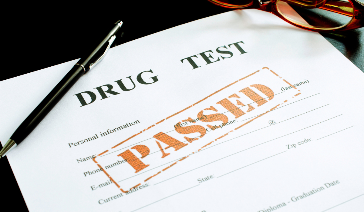 A drug test paper indication a "Pass" on a workplace drug and alcohol screening