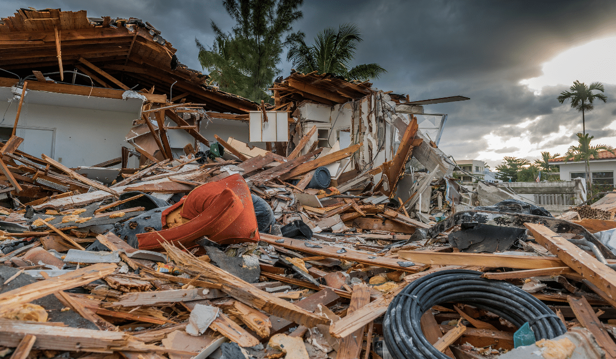 A large pile of debris following the aftermath of a hurricane, likely with hidden respiratory dangers